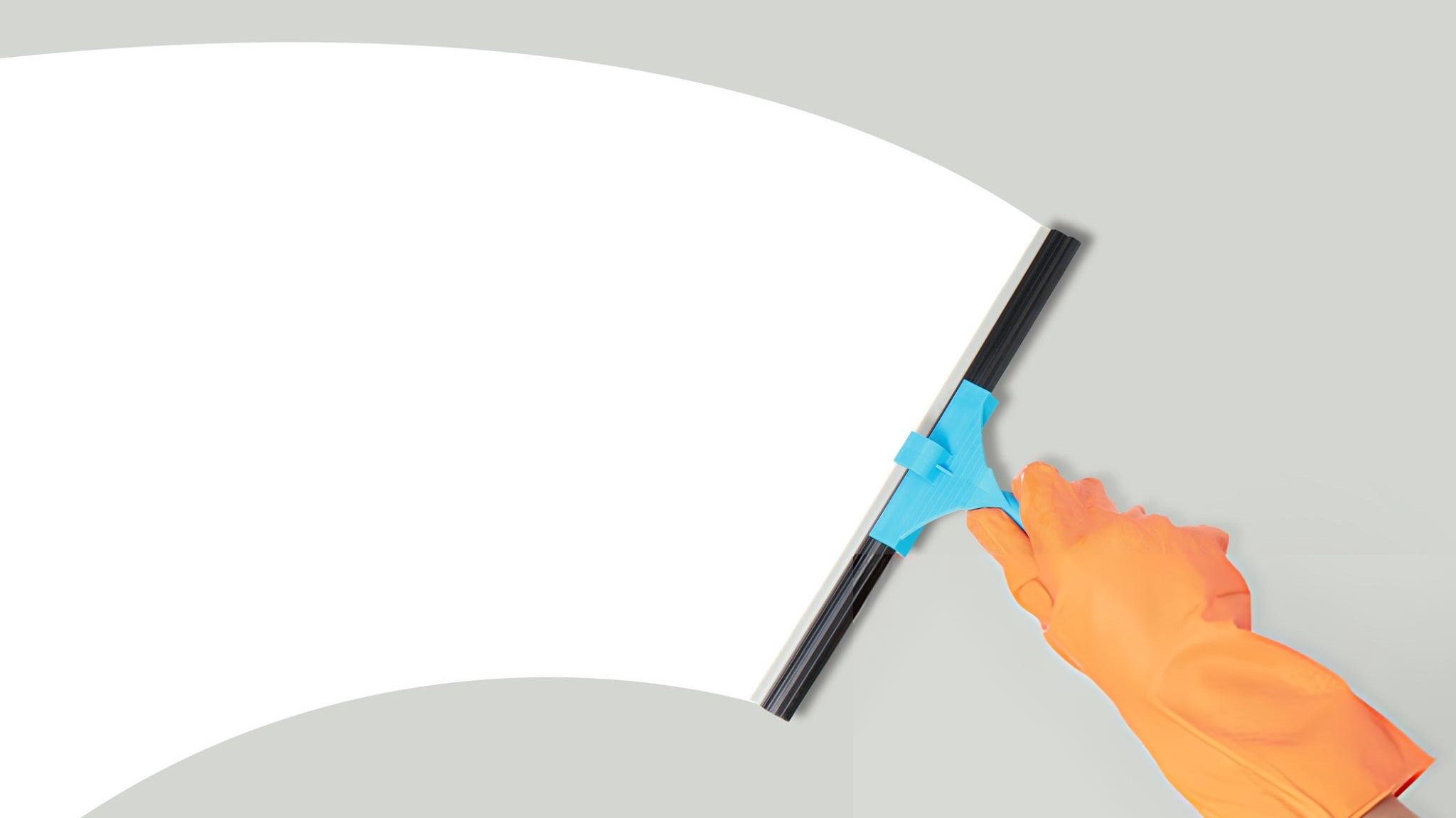 Professional window squeegee set with spray bottle and scrubber in front of a streak free glass window