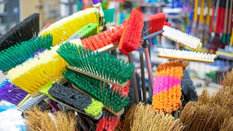 Floor brushes and squeegees arranged for scrubbing, sweeping and water removal